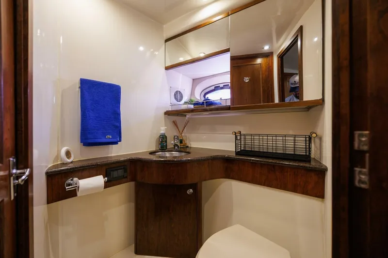 Why Knot Yacht Photos Pics Luxurious bathroom in 2010 Meridian 391 Sedan yacht with modern amenities.