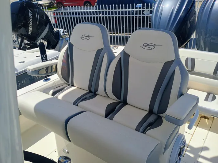 270-912 Yacht Photos Pics 2024 ShearWater 270 Carolina SS Open Bow boat seats with stylish design and Mercury engine.