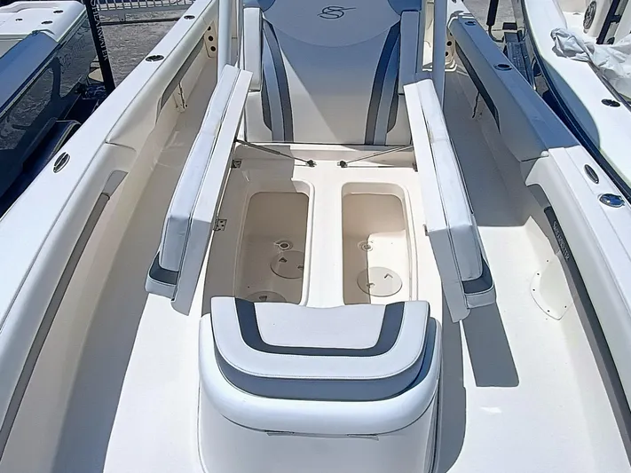 270-912 Yacht Photos Pics 2024 ShearWater 270 Carolina SS Open Bow with spacious seating and storage compartments.