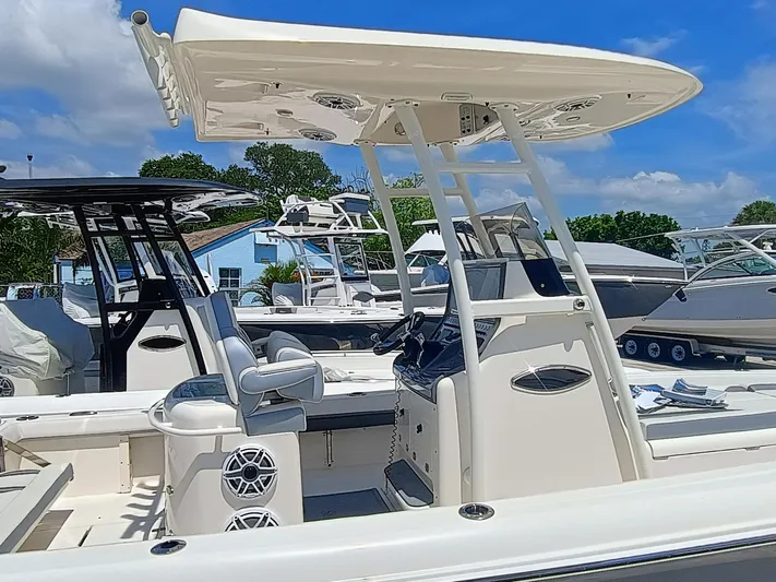 270-912 Yacht Photos Pics 2024 ShearWater 270 Carolina SS Open Bow boat, sleek design, modern features, sunny day.