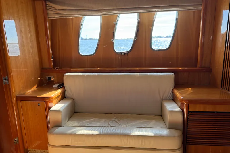  Yacht Photos Pics Interior of 2005 Sunseeker 75 Sport Yacht with leather sofa and ocean view windows.