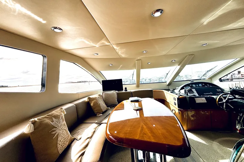  Yacht Photos Pics Luxurious interior of a 2005 Sunseeker 75 Sport Yacht with elegant seating and helm.