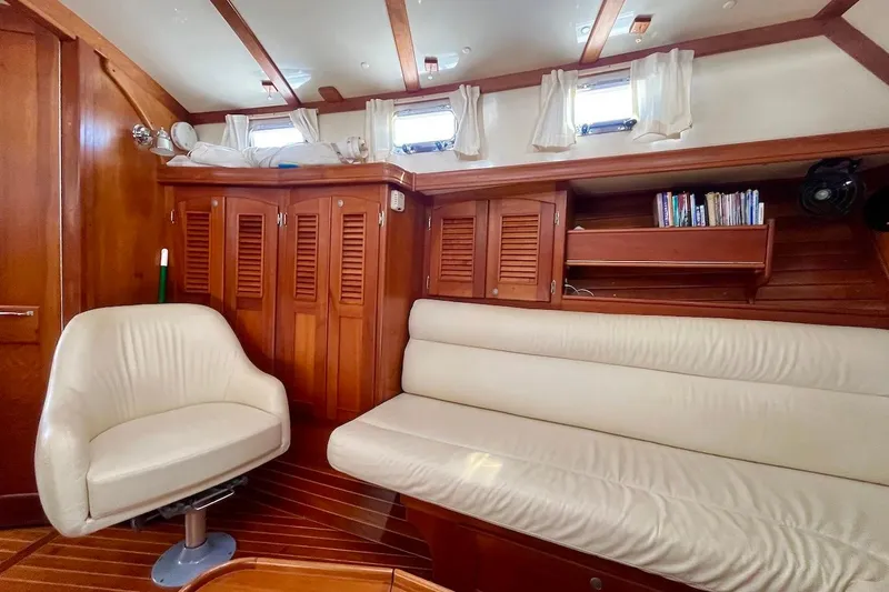 Yacht Photos Pics Luxurious 1997 Gozzard 44 yacht interior with elegant wood finish and comfortable seating.