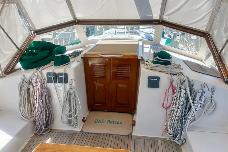  Yacht Photos Pics Cockpit of 1997 Gozzard 44 sailboat with ropes and wooden hatch.