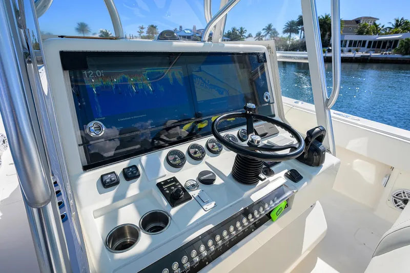  Yacht Photos Pics 2008 SeaVee 39b boat dashboard with steering wheel and navigation controls.