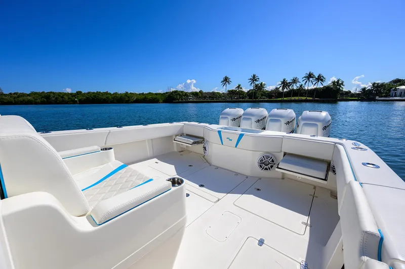  Yacht Photos Pics 2008 SeaVee 39b boat with quad engines on a sunny day, tropical backdrop.
