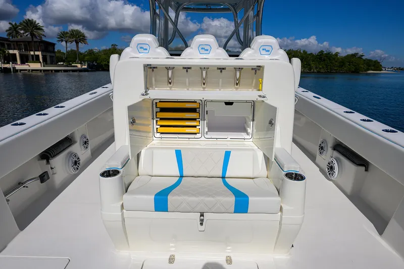  Yacht Photos Pics 2008 SeaVee 39b boat interior with seating, storage, and rod holders on a sunny day.