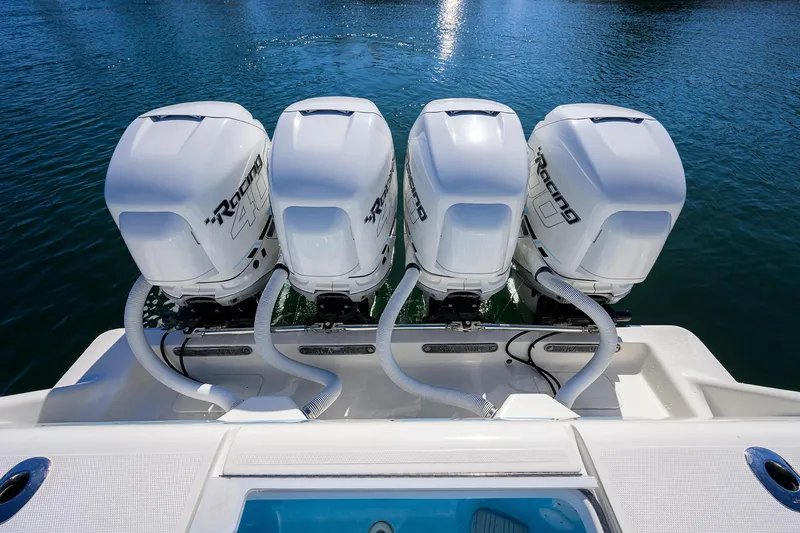  Yacht Photos Pics 2008 SeaVee 39b boat with four powerful outboard engines on calm water.