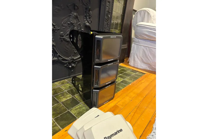 Jane Yacht Photos Pics Raymarine marine electronics for 2002 J Boats J/120, displayed indoors on wooden floor.