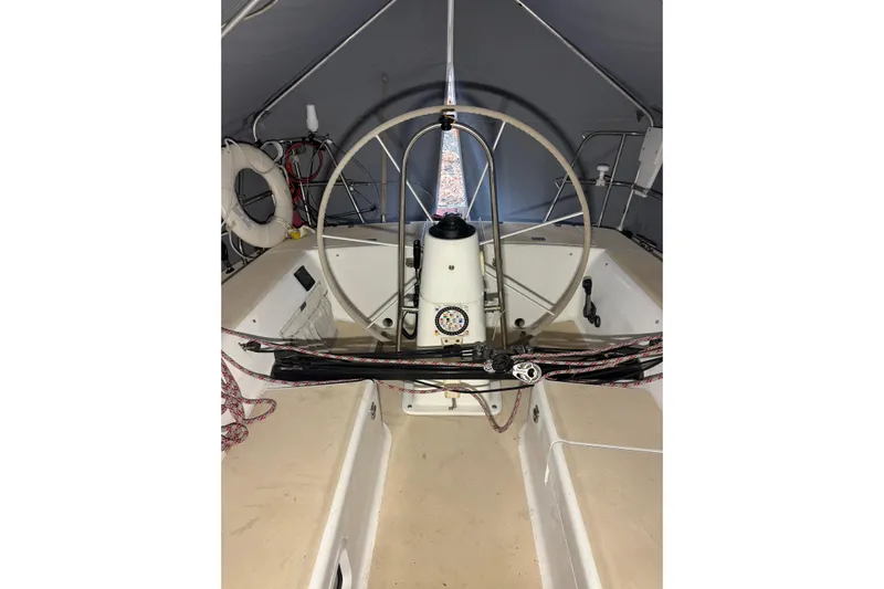 Jane Yacht Photos Pics 2002 J Boats J/120 sailboat cockpit with steering wheel and rigging.