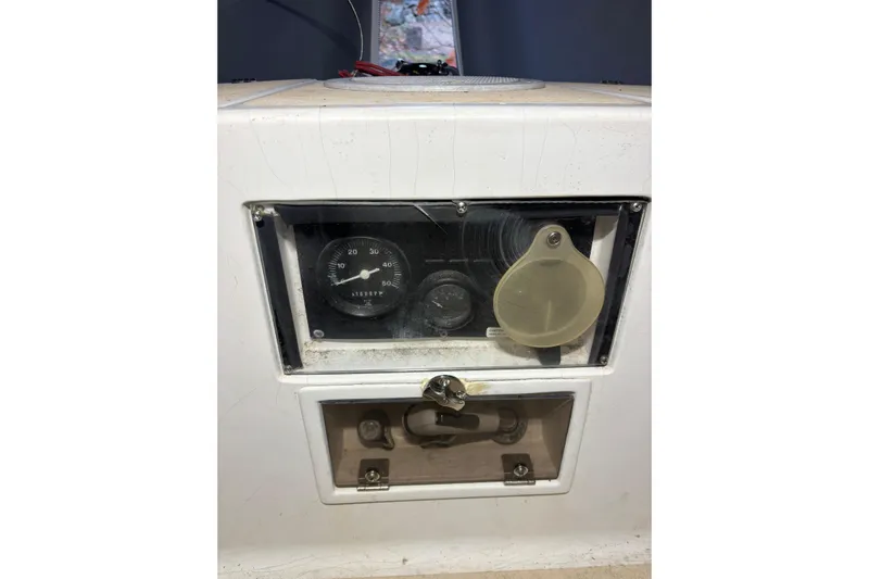 Jane Yacht Photos Pics Instrument panel of a 2002 J Boats J/120 sailboat, featuring gauges and controls.