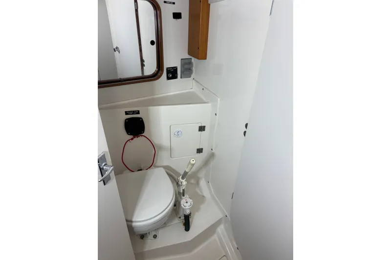 Jane Yacht Photos Pics 2002 J Boats J/120 yacht bathroom with toilet and mirror.