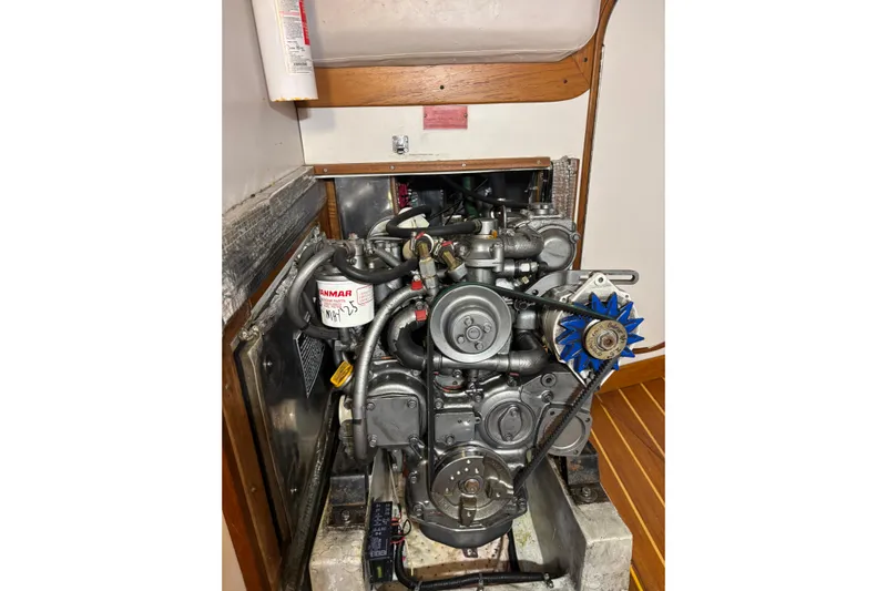 Jane Yacht Photos Pics Engine compartment of a 2002 J Boats J/120 sailboat, featuring a Yanmar engine.