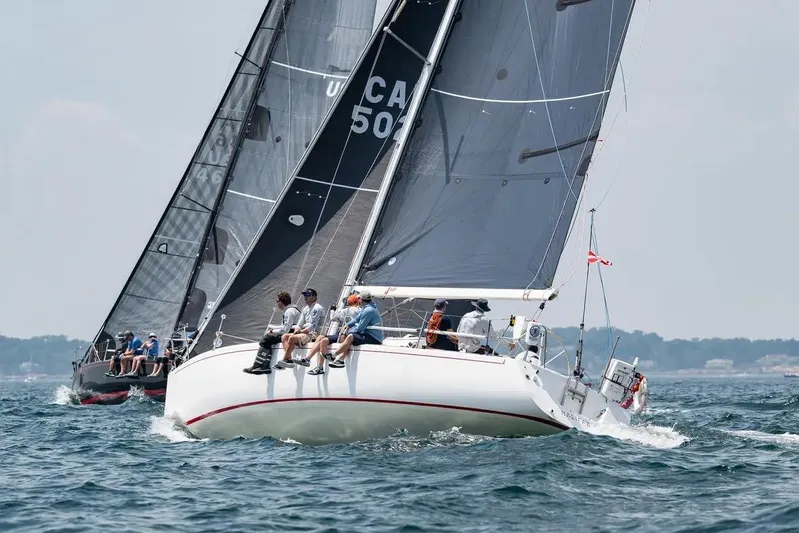Jane Yacht Photos Pics Sailboats racing on open water, featuring a 2002 J Boats J/120 model.