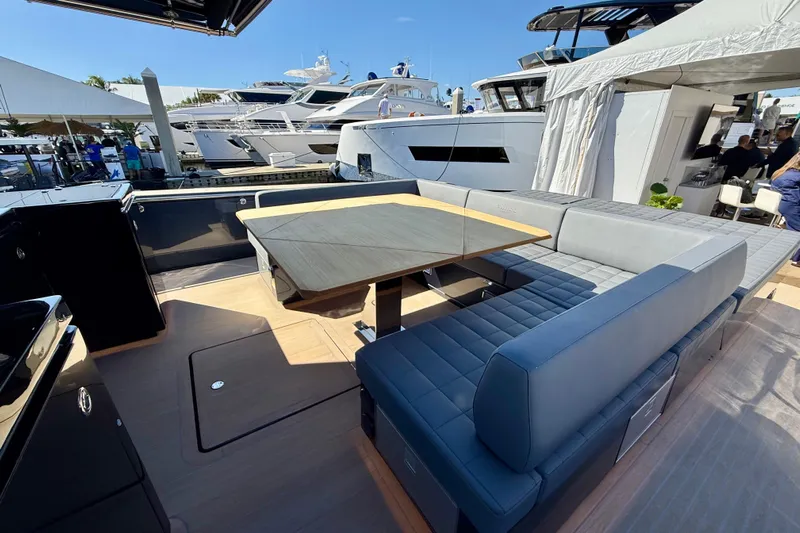  Yacht Photos Pics Luxurious seating area on a 2026 Pardo Yachts 50, docked at a marina.