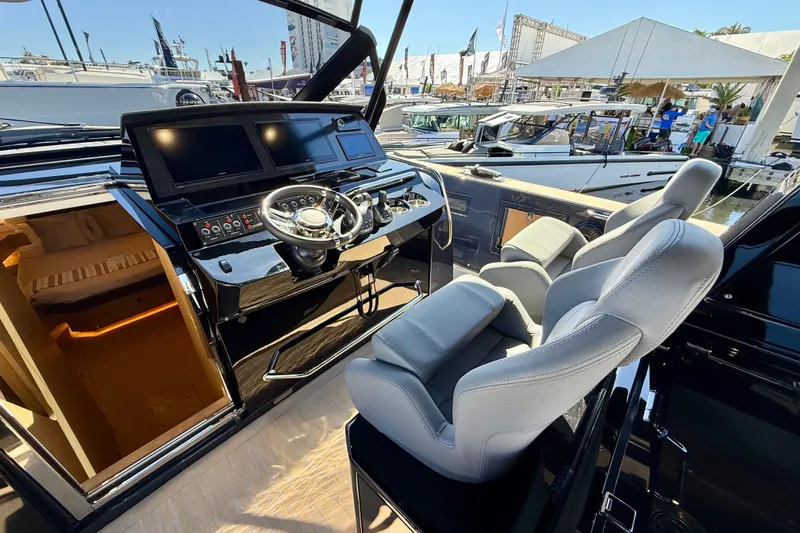  Yacht Photos Pics Helm of 2026 Pardo Yachts 50 with modern controls and luxurious seating.