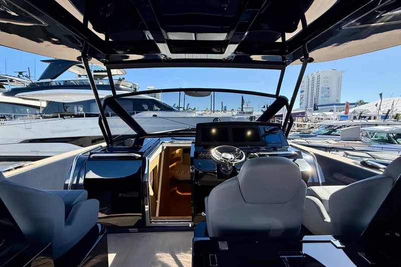  Yacht Photos Pics Interior view of 2026 Pardo Yachts 50, showcasing modern helm and luxurious seating.