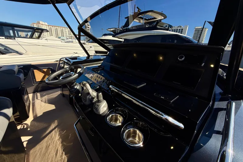  Yacht Photos Pics Interior view of 2026 Pardo Yachts 50 helm with modern controls and luxurious design.