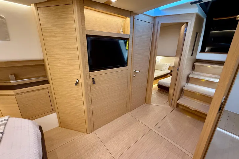  Yacht Photos Pics Luxurious interior of 2026 Pardo Yachts 50, featuring modern wood finishes and elegant design.