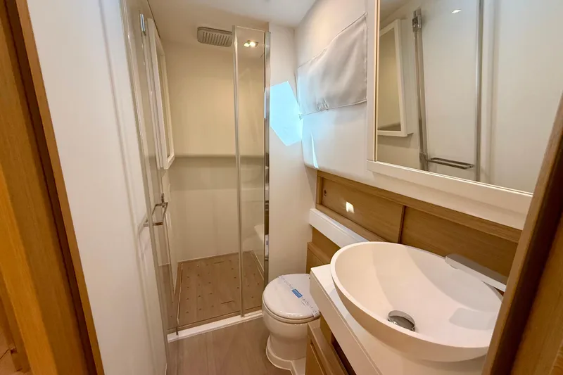  Yacht Photos Pics Modern bathroom in 2026 Pardo Yachts 50, featuring sleek design and wood accents.