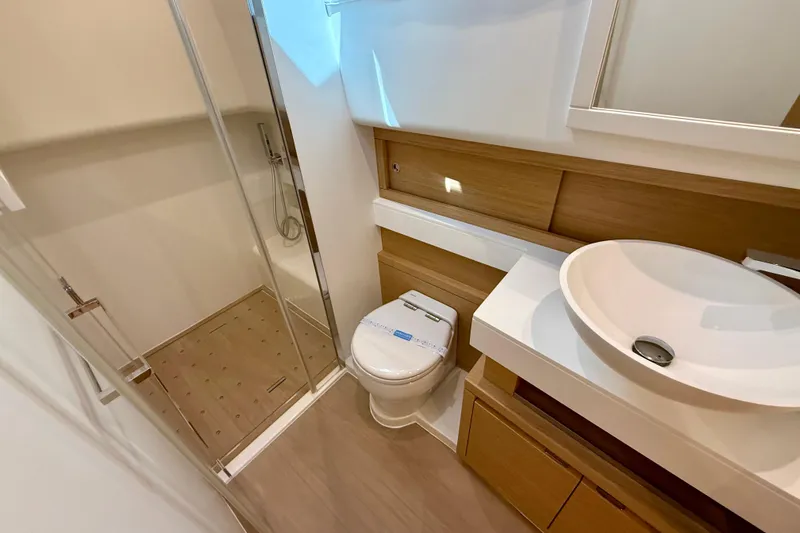  Yacht Photos Pics Modern bathroom in 2026 Pardo Yachts 50, featuring sleek shower and elegant sink design.