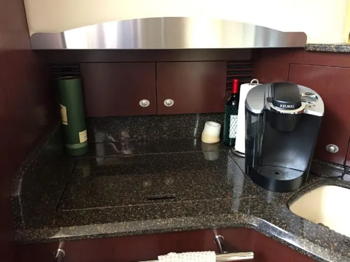 Summer Sanity VI Yacht Photos Pics Galley kitchen in 2007 Sea Ray 44 Sedan Bridge with Keurig coffee maker.
