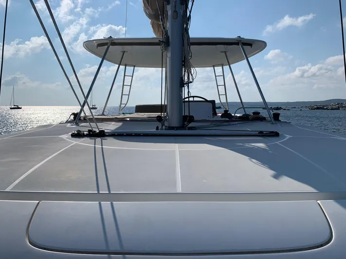Martina Yacht Photos Pics Lagoon 46 catamaran deck view, 2021 model, sailing on a sunny day.