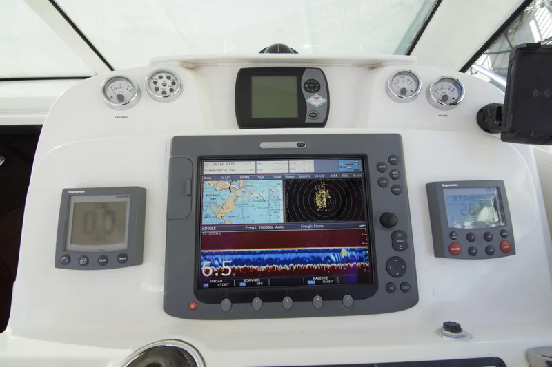 Finn Yacht Photos Pics Dashboard of a 2006 Tiara Yachts 3000 Open with navigation and control instruments.