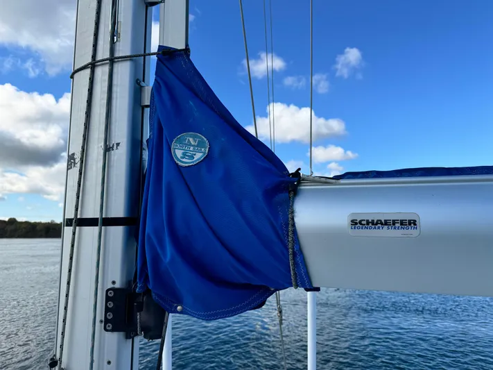 Heeling Alright Yacht Photos Pics Jeanneau Sun Odyssey 40 sailboat mast detail with blue cover, Schaefer equipment, 2001 model.