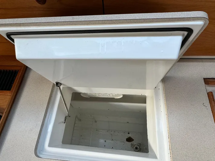 Heeling Alright Yacht Photos Pics Open storage compartment on 2001 Jeanneau Sun Odyssey 40 sailboat.