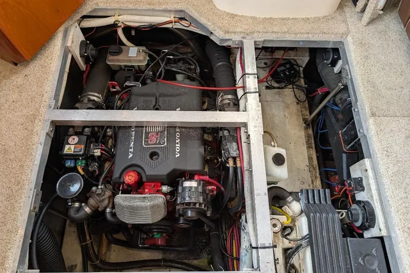 This New Interior Is Amazing! Yacht Photos Pics Engine compartment of a 2003 Carver 356 Motor Yacht, featuring a Volvo Penta engine.