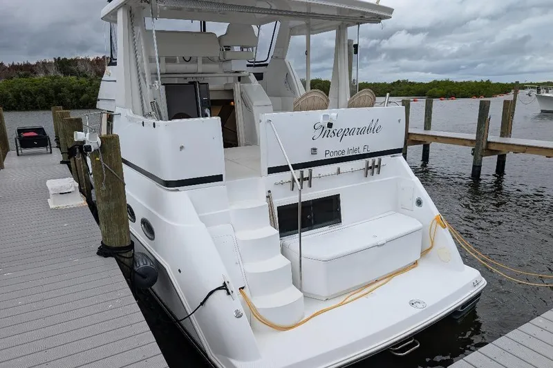 This New Interior Is Amazing! Yacht Photos Pics 2003 Carver 356 Motor Yacht docked at marina, named "Inseparable," Ponce Inlet, FL.