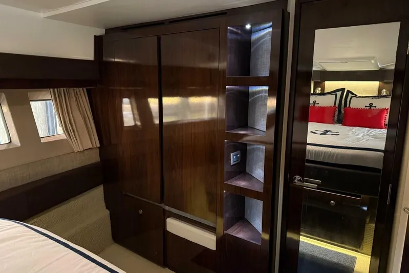 Lady Laura Yacht Photos Pics Luxurious 2016 Sea Ray Sundancer 400 cabin interior with elegant wood finishes and nautical decor.