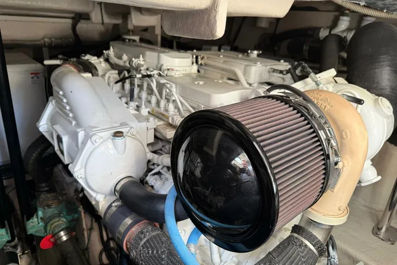 Lady Laura Yacht Photos Pics Engine compartment of a 2016 Sea Ray Sundancer 400 yacht, showcasing detailed components.