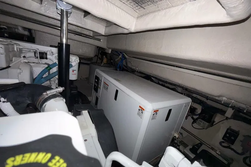 Lady Laura Yacht Photos Pics Engine room of 2016 Sea Ray Sundancer 400 with generator and mechanical components.