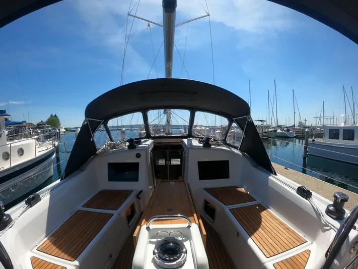 Flyin Yacht Photos Pics Cockpit view of 2020 Jeanneau Sun Odyssey 410 sailboat docked at marina.