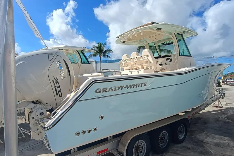 336-617 Yacht Photos Pics 2026 Grady-White Canyon 336 boat on trailer, sunny day.