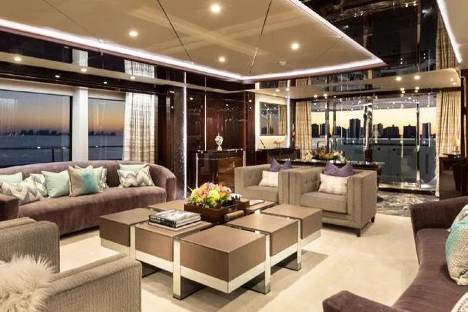 M/y Nexus Yacht Photos Pics Luxurious interior of 2019 Sunseeker 40 Metre Yacht with elegant seating and panoramic windows.