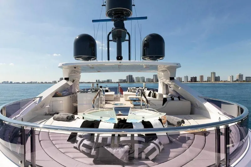 M/y Nexus Yacht Photos Pics Luxurious 2019 Sunseeker 40 Metre Yacht with city skyline in the background.