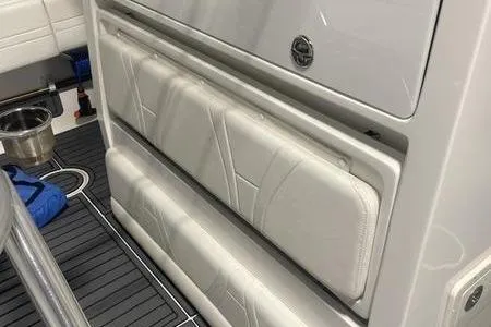  Yacht Photos Pics 2022 Prowler 31 boat interior with cushioned seating and storage compartments.