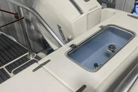  Yacht Photos Pics 2022 Prowler 31 boat with Mercury engine and livewell in a sleek design.