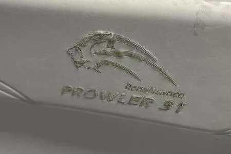  Yacht Photos Pics 2022 Prowler 31 logo with sleek design and embossed lettering.