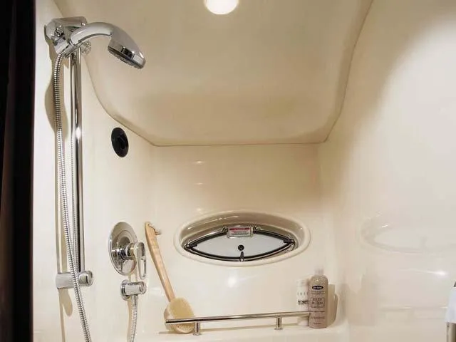 "jimi Thing Iv" Yacht Photos Pics Luxurious shower area in 2007 Sea Ray 38 Sundancer yacht, featuring modern fixtures.