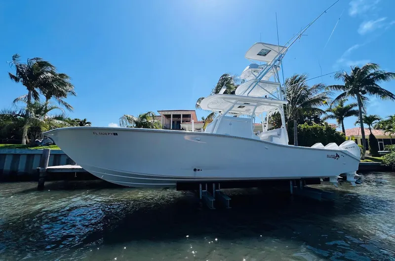  Yacht Photos Pics 2015 Billfish 39 Custom CC boat docked near palm trees.