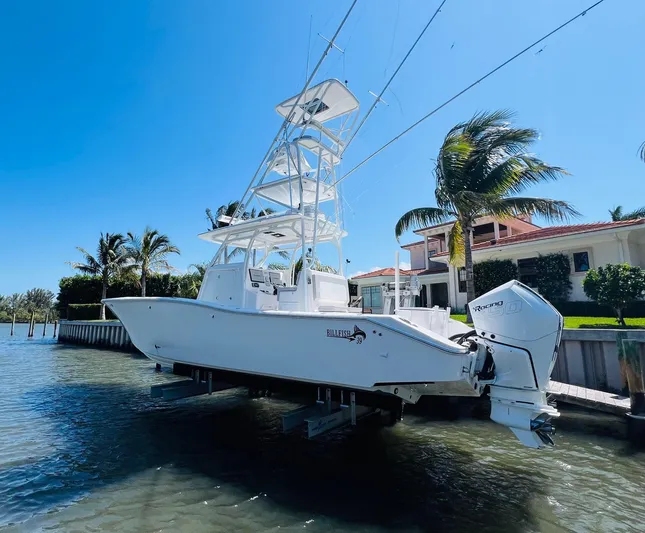  Yacht Photos Pics 2015 Billfish 39 Custom CC boat docked near waterfront property.