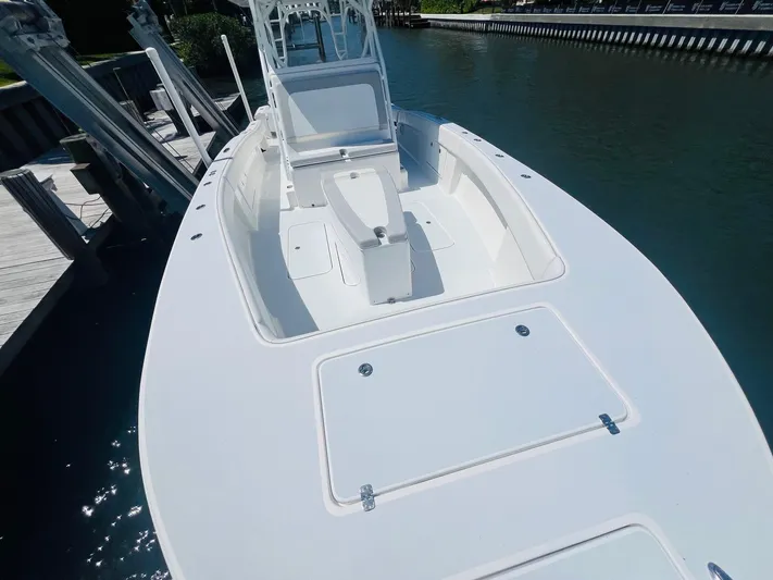  Yacht Photos Pics 2015 Billfish 39 Custom CC boat docked by the water.