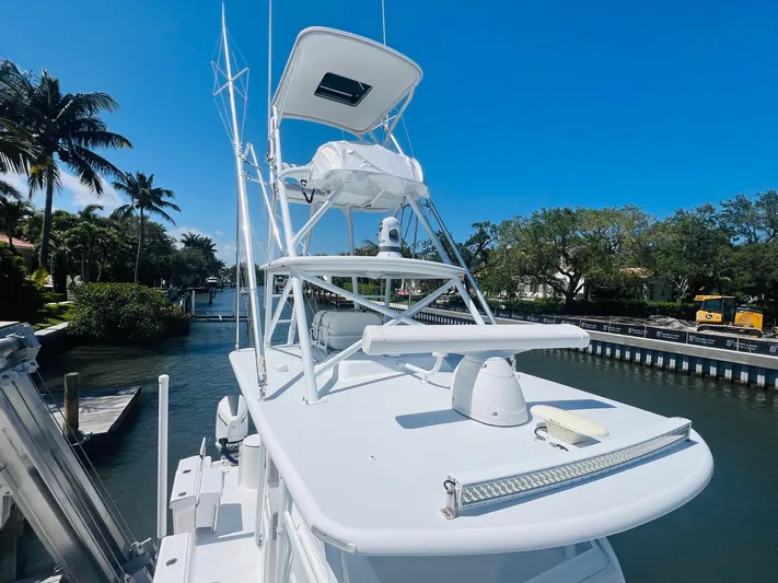  Yacht Photos Pics 2015 Billfish 39 Custom CC boat docked in a sunny marina.
