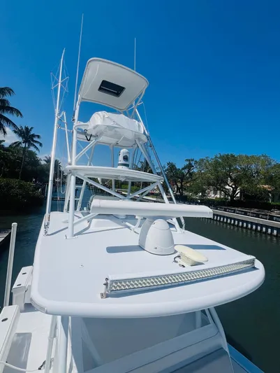  Yacht Photos Pics 2015 Billfish 39 Custom CC boat with tower and clear blue sky.