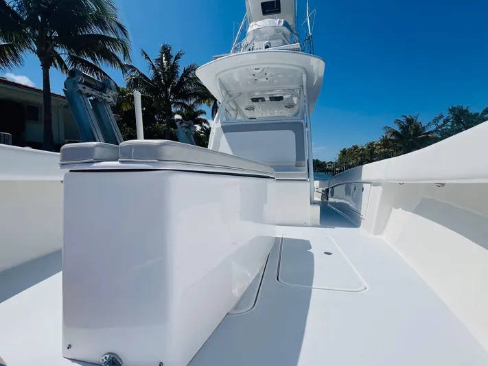  Yacht Photos Pics 2015 Billfish 39 Custom CC boat with sleek white deck and modern design.