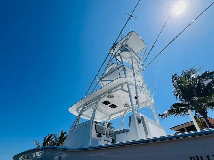  Yacht Photos Pics 2015 Billfish 39 Custom CC boat under clear blue sky